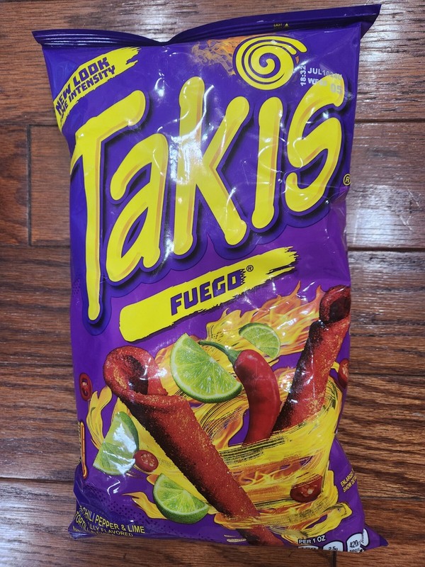 TAKIS FUEGO TORTILLA CHIPS HOT CHILI PEPPER & LIME NET WT 9.9 OZ 09/2024