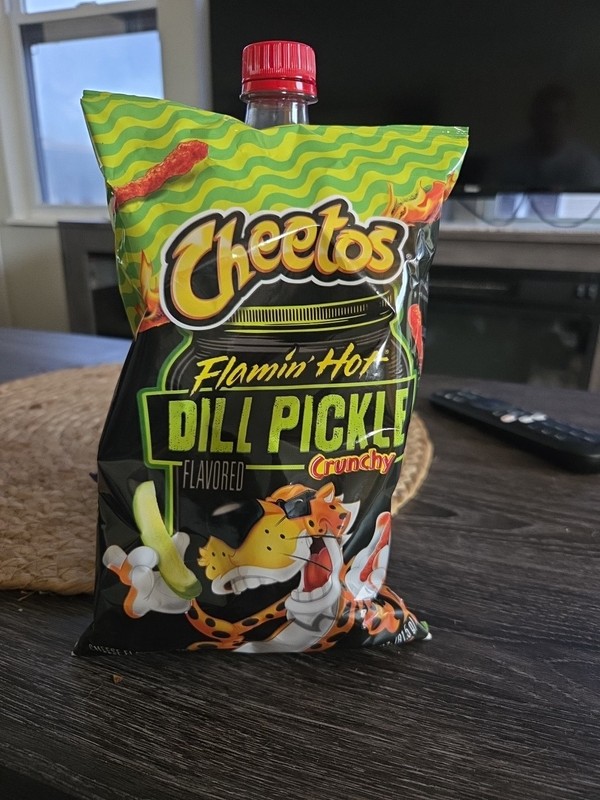 Flaming Hot Dill Pickle Cheetos 2 And 7/8 Size Bag.